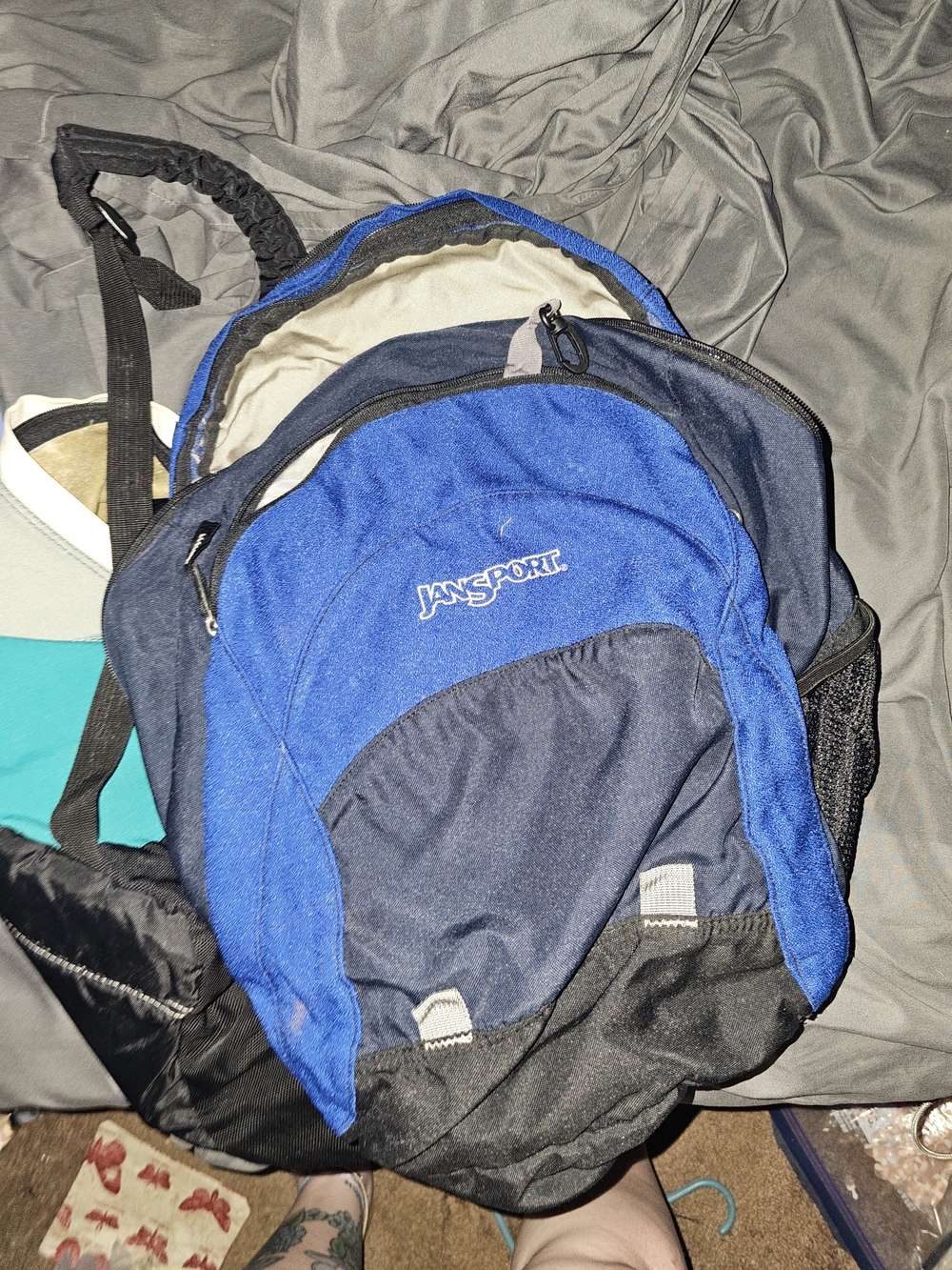 Jansport Blue and Black Backpack with Multiple Compartments